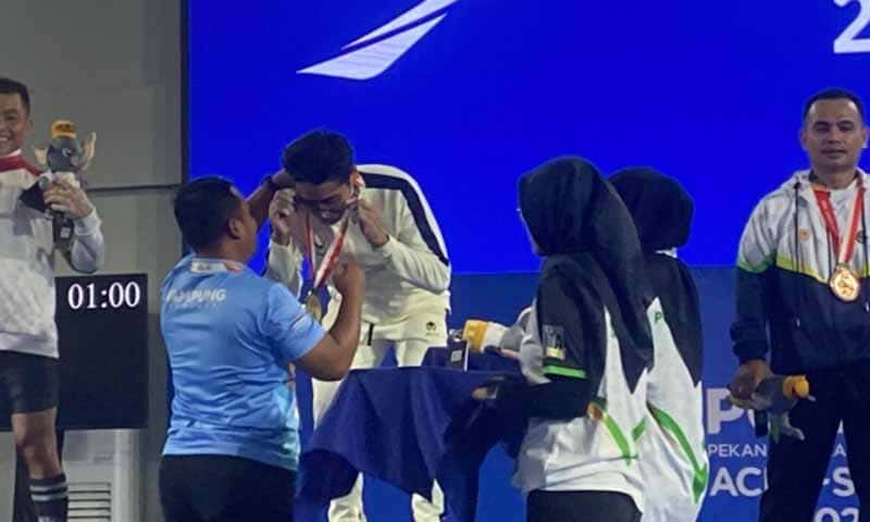 Atlet Lifter Lampung Doni Meiyanto raih medali emas | Foto: Ist.