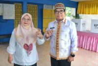 Pj Gubernur Lampung Samsudin bersama istri | Foto: Ist.