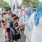 Kolaborasi TP PKK, DWP, dan OPD Lampung Bagikan 300 Paket Takjil Ramadan | Foto: Ist.