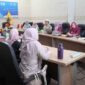 Sekretaris Dinas Komunikasi, Informatika dan Statistik (Diskominfotik) Provinsi Lampung, Elip Heldan, memimpin rapat persiapan Evaluasi Penyelenggaraan Statistik Sektoral (EPSS) 2026 | Foto: Ist.